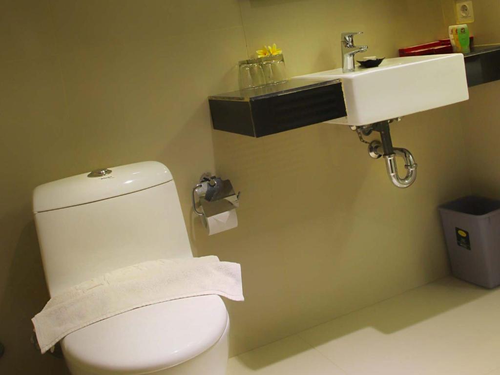 Dragon Inn Kendari Szoba fotó