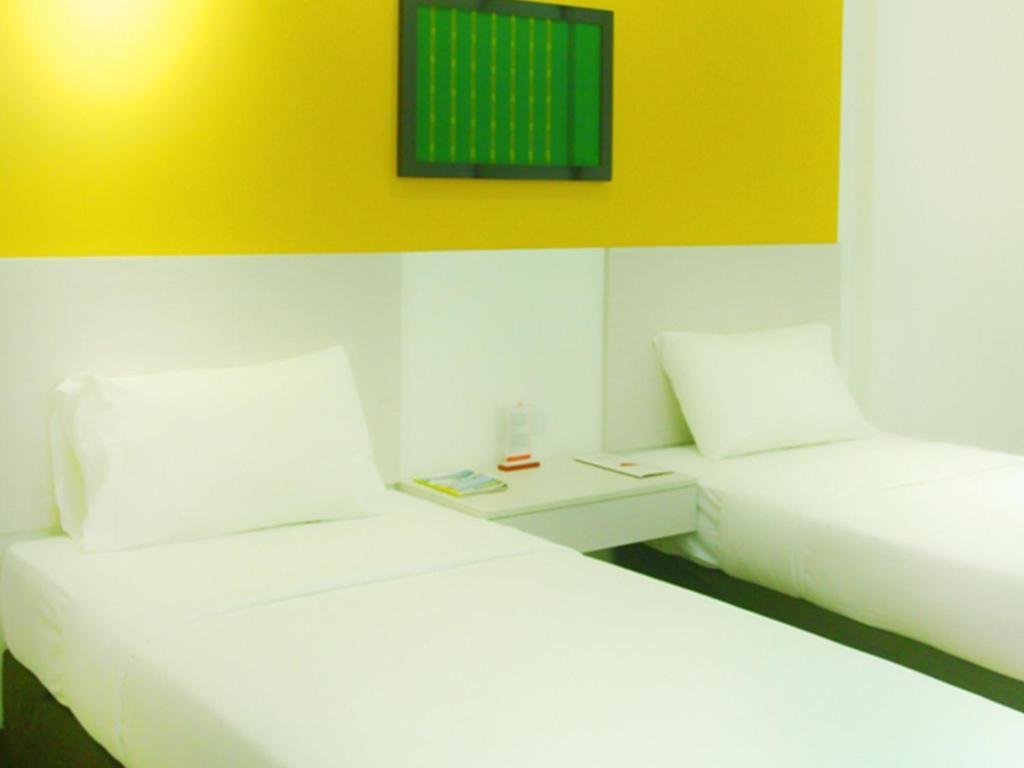 Dragon Inn Kendari Szoba fotó