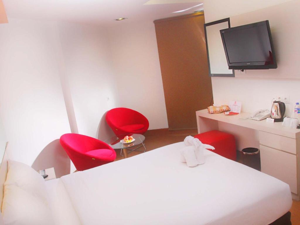 Dragon Inn Kendari Szoba fotó